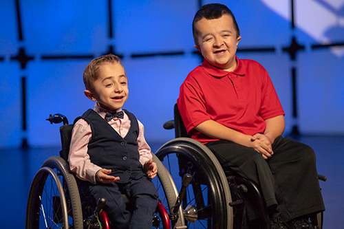 2 people one a wheelchair