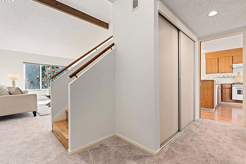 Inside the donated condo, showing the stairs to upstairs